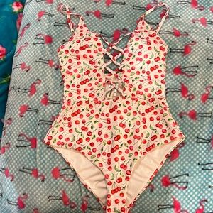 BNWT Dippin Daisy’s one piece cherry print swimsuit